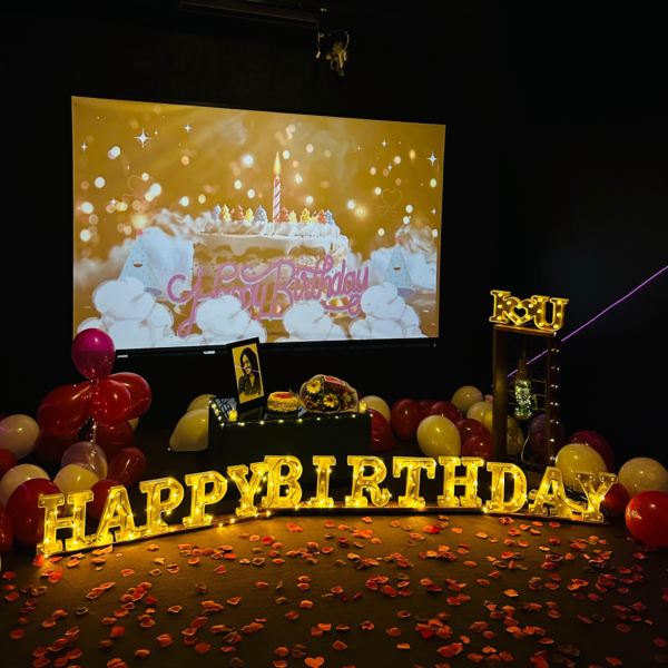 Birthday celebration setup inside a private cinema